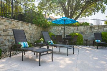 Lounge Chairs & Umbrella At The Sundeck